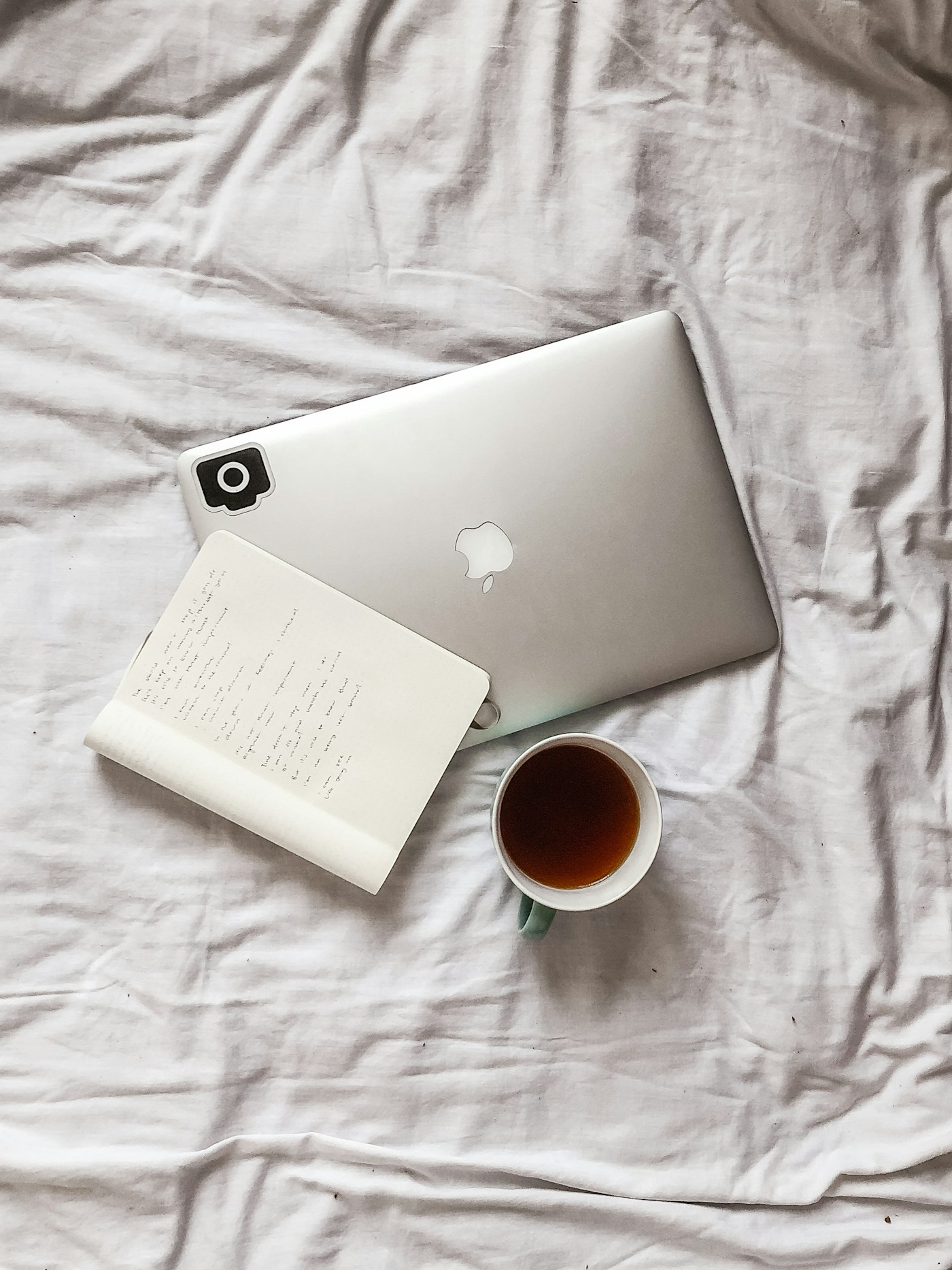 Open notebook on a laptop for comparing certification practice question resources
